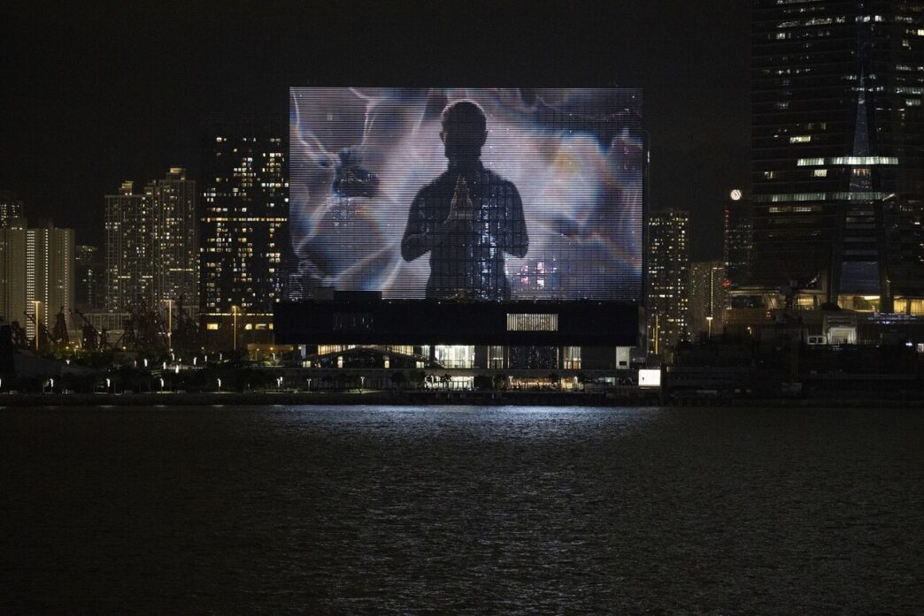 Screening of The Shape of Light on the M+ Facade, M+, West Kowloon Cultural District, Hong Kong, 2022. Courtesy of Ellen Pau and M+, Hong Kong. Photo: Lok Cheng. M+, Hong Kong.