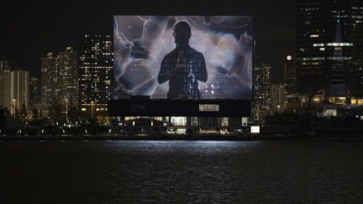 Screening of The Shape of Light on the M+ Facade, M+, West Kowloon Cultural District, Hong Kong, 2022. Courtesy of Ellen Pau and M+, Hong Kong. Photo: Lok Cheng. M+, Hong Kong.