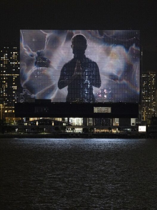 Screening of The Shape of Light on the M+ Facade, M+, West Kowloon Cultural District, Hong Kong, 2022. Courtesy of Ellen Pau and M+, Hong Kong. Photo: Lok Cheng. M+, Hong Kong.