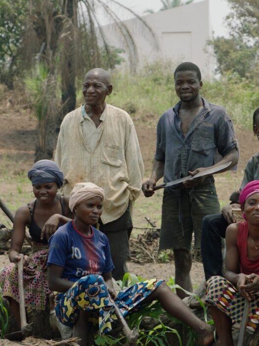 Renzo Martens, White Cube (still), 2020. CATPC members, from left: Olele Mulela Mabamba, Huguette Kilembi, Mbuku Kimpala, Jeremie Mabiala, Jean Kawata, Irene Kanga, Ced’art Tamasala and Matthieu Kasiama. © Human Activities, 2020.