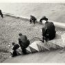 Ilse Bing, Three Men Sitting on the Steps by the Seine, 1931. International Center of Photography, New York, donation of Ilse Bing, 1991. © Estate of Ilse Bing.