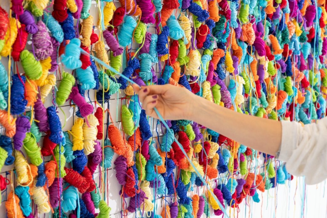 Irena Lagator Pejović, Nets, Nodes, Horizons, 2020. Interactive wall installation (hand-made colored yarn balls, nets, nodes), 105 × 620 cm. Courtesy of the artist. Photo: Lazar Pejović.