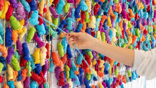 Irena Lagator Pejović, Nets, Nodes, Horizons, 2020. Interactive wall installation (hand-made colored yarn balls, nets, nodes), 105 × 620 cm. Courtesy of the artist. Photo: Lazar Pejović.