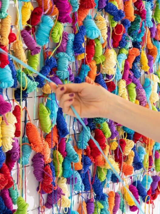 Irena Lagator Pejović, Nets, Nodes, Horizons, 2020. Interactive wall installation (hand-made colored yarn balls, nets, nodes), 105 × 620 cm. Courtesy of the artist. Photo: Lazar Pejović.