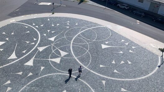 Katja Davar, Globe of Glass, 2022. Lasa marble, basalt, total area 850 m2. Courtesy of the artist and Fraunhofer IEE. © Katja Davar. Photo: zone4, Cologne.