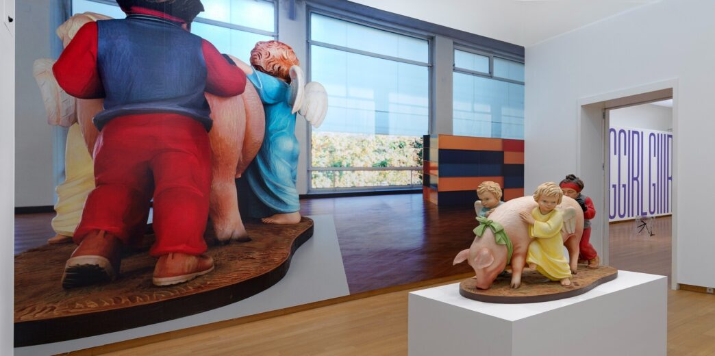 Louise Lawler, Produced in 1988, Purchased in 1989; Produced in 1989, Purchased in 1993 (adjusted to fit), 1995/2010, and Jeff Koons, Ushering in Banality, 1988. In the background: Martine Syms, GIRRRLGIRLLLGGGIRLGIIIRL, 2017, wall painting. All: collection Stedelijk Museum Amsterdam. Photo: Gert Jan van Rooij, Amsterdam.