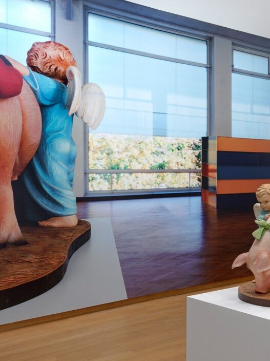 Louise Lawler, Produced in 1988, Purchased in 1989; Produced in 1989, Purchased in 1993 (adjusted to fit), 1995/2010, and Jeff Koons, Ushering in Banality, 1988. In the background: Martine Syms, GIRRRLGIRLLLGGGIRLGIIIRL, 2017, wall painting. All: collection Stedelijk Museum Amsterdam. Photo: Gert Jan van Rooij, Amsterdam.