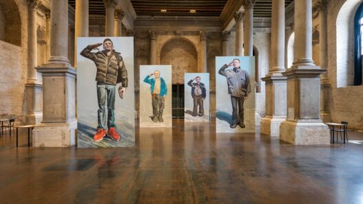 Lesia Khomenko, Max in the Army, 2022. Acrylic on canvas. Installation view, This is Ukraine: Defending Freedom @ Venice 2022, Venice. Photo: Pat Verbruggen/PinchukArtCentre.