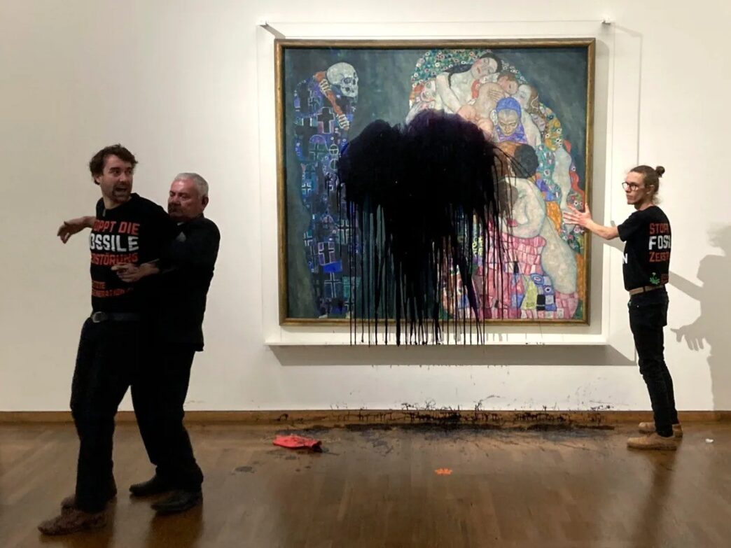 Gustav Klimt's painting Life and Death is shown unharmed beneath a glass cover after activists from Last Generation Austria splashed oil on it in Vienna's Leopold museum on November 15. Members of the group tweeted that they chose the 1915 picture to protest their government's use of fossil fuels. (The Associated Press/Letzte Generation Oesterreich)