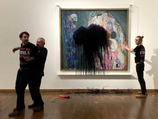 Gustav Klimt's painting Life and Death is shown unharmed beneath a glass cover after activists from Last Generation Austria splashed oil on it in Vienna's Leopold museum on November 15. Members of the group tweeted that they chose the 1915 picture to protest their government's use of fossil fuels. (The Associated Press/Letzte Generation Oesterreich)