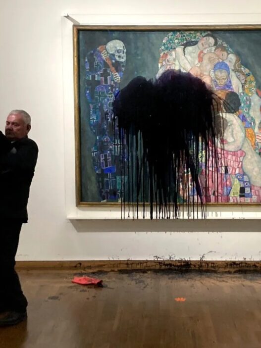 Gustav Klimt's painting Life and Death is shown unharmed beneath a glass cover after activists from Last Generation Austria splashed oil on it in Vienna's Leopold museum on November 15. Members of the group tweeted that they chose the 1915 picture to protest their government's use of fossil fuels. (The Associated Press/Letzte Generation Oesterreich)