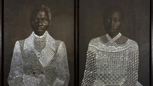 Sasha Huber, Tailoring Freedom – Renty and Delia, 2021. Metal staples on photograph on wood, 97 x 69 cm. Courtesy the artist, Tamara Lanier, and the Peabody Museum of Archaeology and Ethnology, Harvard University.