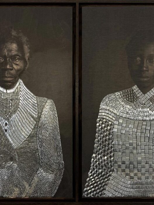 Sasha Huber, Tailoring Freedom – Renty and Delia, 2021. Metal staples on photograph on wood, 97 x 69 cm. Courtesy the artist, Tamara Lanier, and the Peabody Museum of Archaeology and Ethnology, Harvard University.