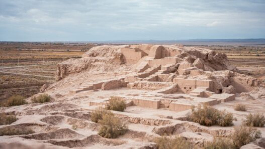 Toprak Kala, also known as the 'Fortress of Earth', is an ancient city located in the Kyzylkum Desert of Uzbekistan. This photo, taken from the top of one of the city's defensive walls, offers a breathtaking view of the surrounding desert and the remains of the city's ancient buildings. . Image © Vyacheslav Pak (courtesy of ACDF)