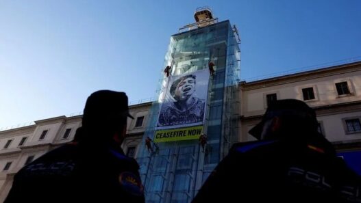 Art Activists Call for Gaza Ceasefire with Giant Banner in Madrid