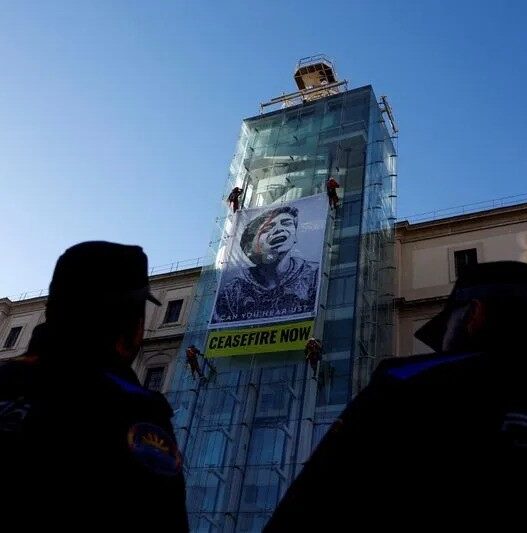 Art Activists Call for Gaza Ceasefire with Giant Banner in Madrid